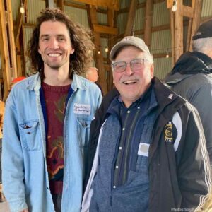 Hayden Wilson with a volunteer at KLT's 2025 Thanks.Giving event.