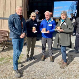 Four volunteers at KLT's 2025 Thanks.Giving event.